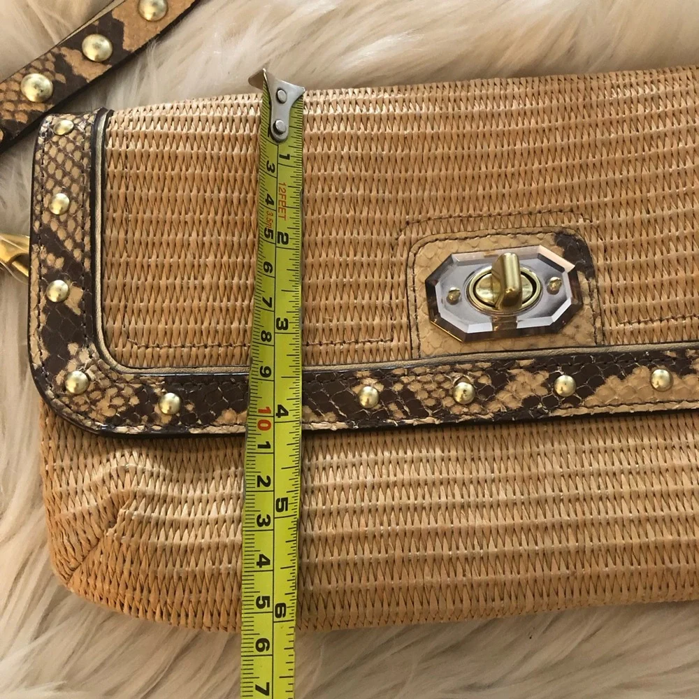 Coach straw snake embossed turn lock wristlet clutch purse